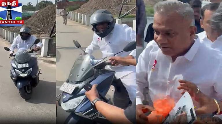 போக்குவரத்து நெரிசலை தவிர்க்க பைக்கில் வந்த அமைச்சர் ஆனந்த்; கூவம் தூர்வாரும் பணிகளை தொடங்கி வைத்தார்
