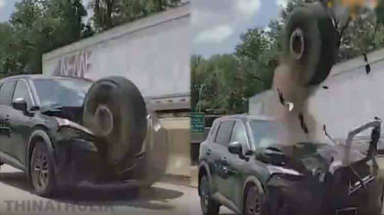 அமெரிக்காவில் பறந்து வந்த ராட்சத டயர்; காரை நொறுக்கியும் அதிர்ஷ்டவசமாக உயிர் தப்பிய குடும்பம்