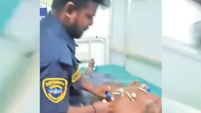 அரசு மருத்துவமனையில் நோயாளிக்கு காவலாளி இ.சி.ஜி. எடுத்தல்