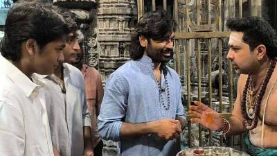 மகன்களுடன் அண்ணாமலையார் கோயிலில் சாமி தரிசனம் செய்த தனுஷ்... கோ-பூஜையிலும் பங்கேற்பு
