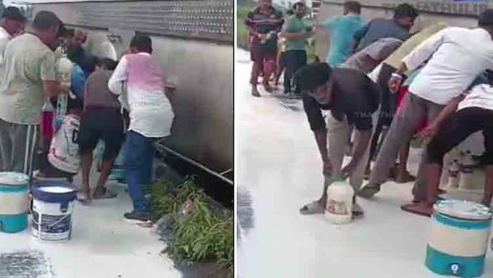சாலையில் கவிழ்ந்த பால் டேங்கர்: போட்டி போட்டு பாத்திரங்களில் பாலை பிடித்து சென்ற மக்கள்