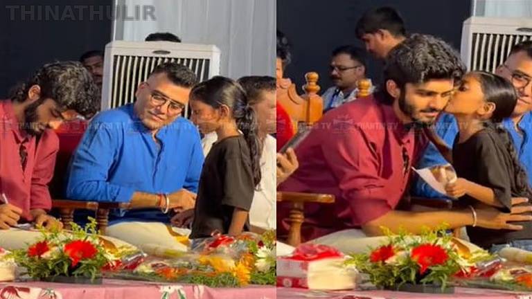 இசை நிகழ்ச்சியில் இசையமைப்பாளருக்கு முத்தப் பரிசளித்த சிறுமி